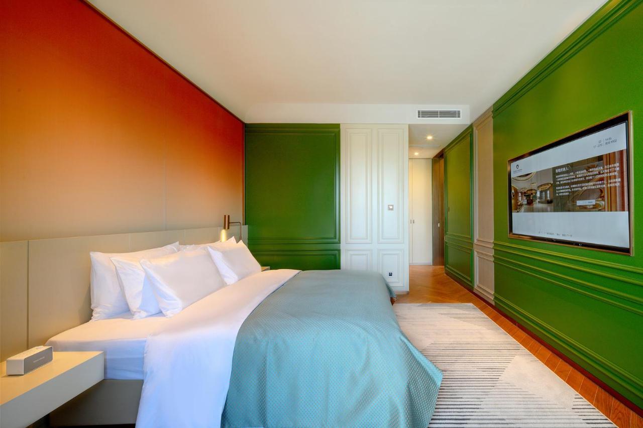 Tsingtao Time Resport Hotel Циндао Экстерьер фото