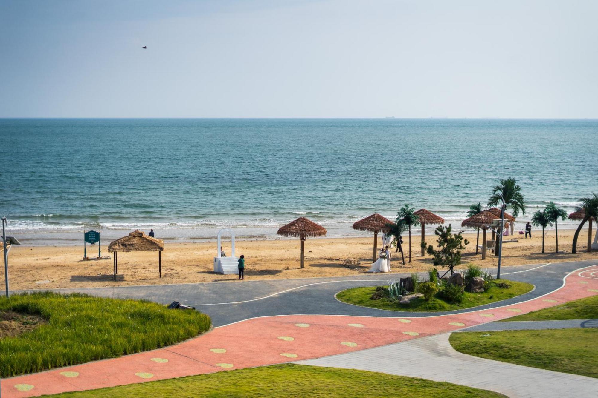 Tsingtao Time Resport Hotel Циндао Экстерьер фото